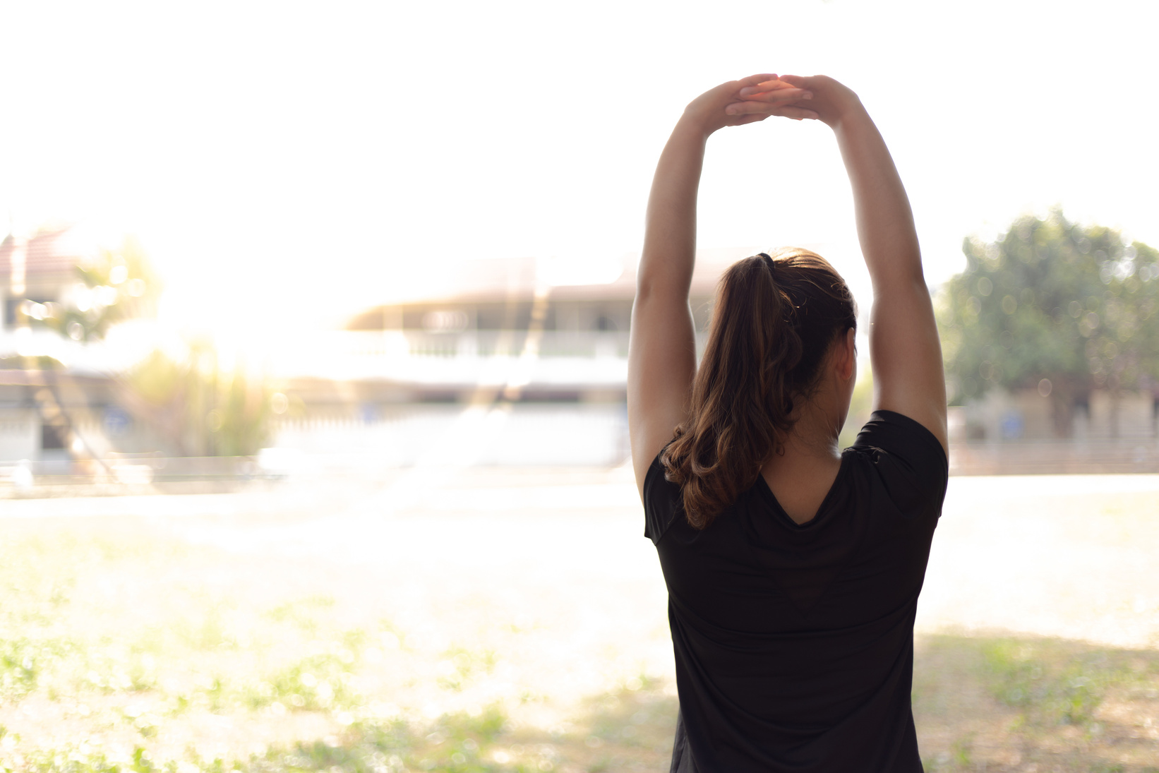 Woman Stretching Outdoors